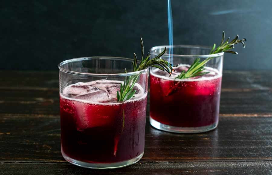 The Art of Smoking mocktails featuring smoked Rosemary. Try this non alcoholic mixer recipe at home. Guaranteed to impress!