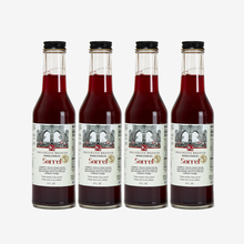 Load image into Gallery viewer, 4 bottles of Caribbean sorrel on a white background